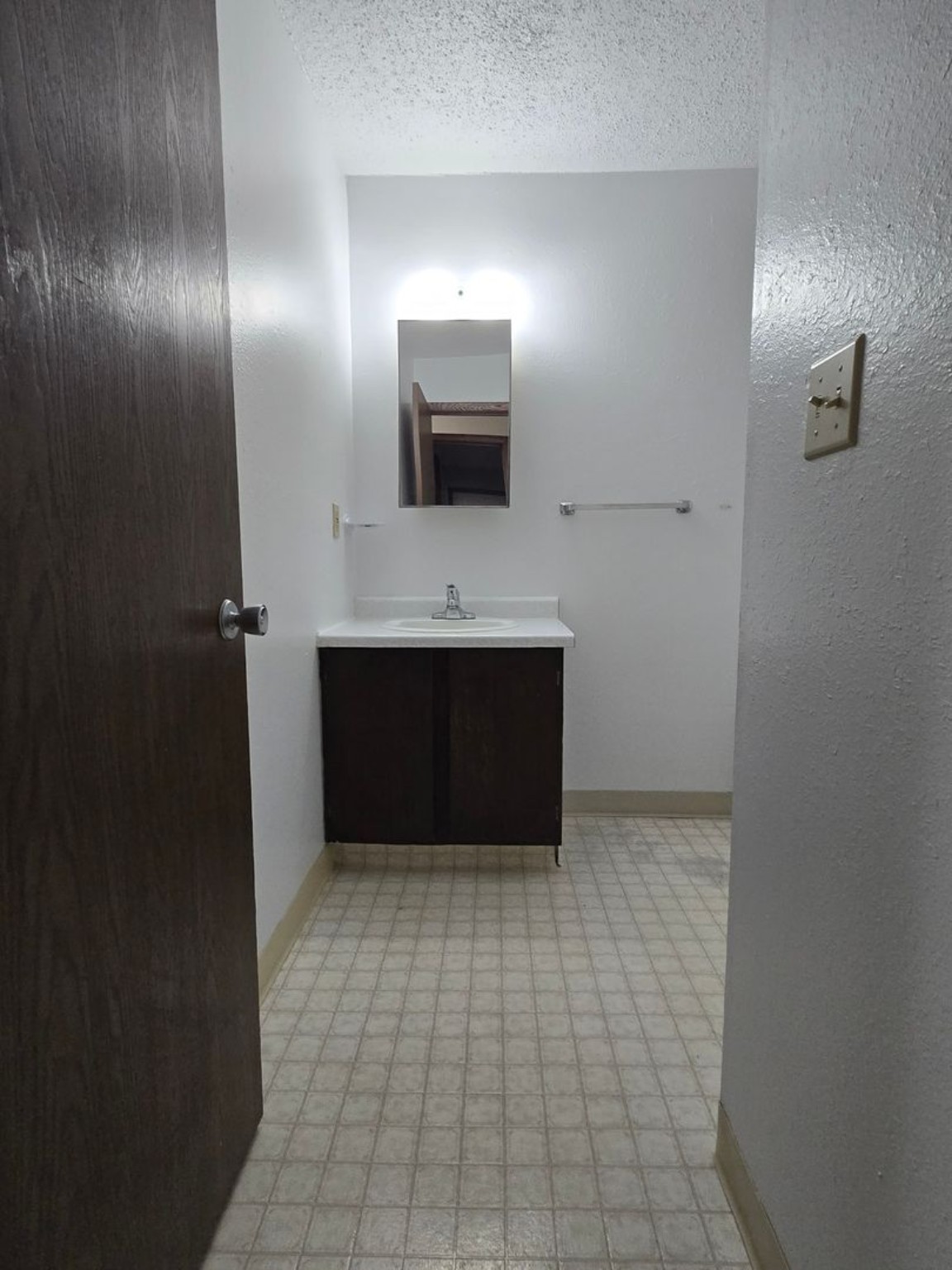 Courtwood one-bedroom apartment bathroom vanity