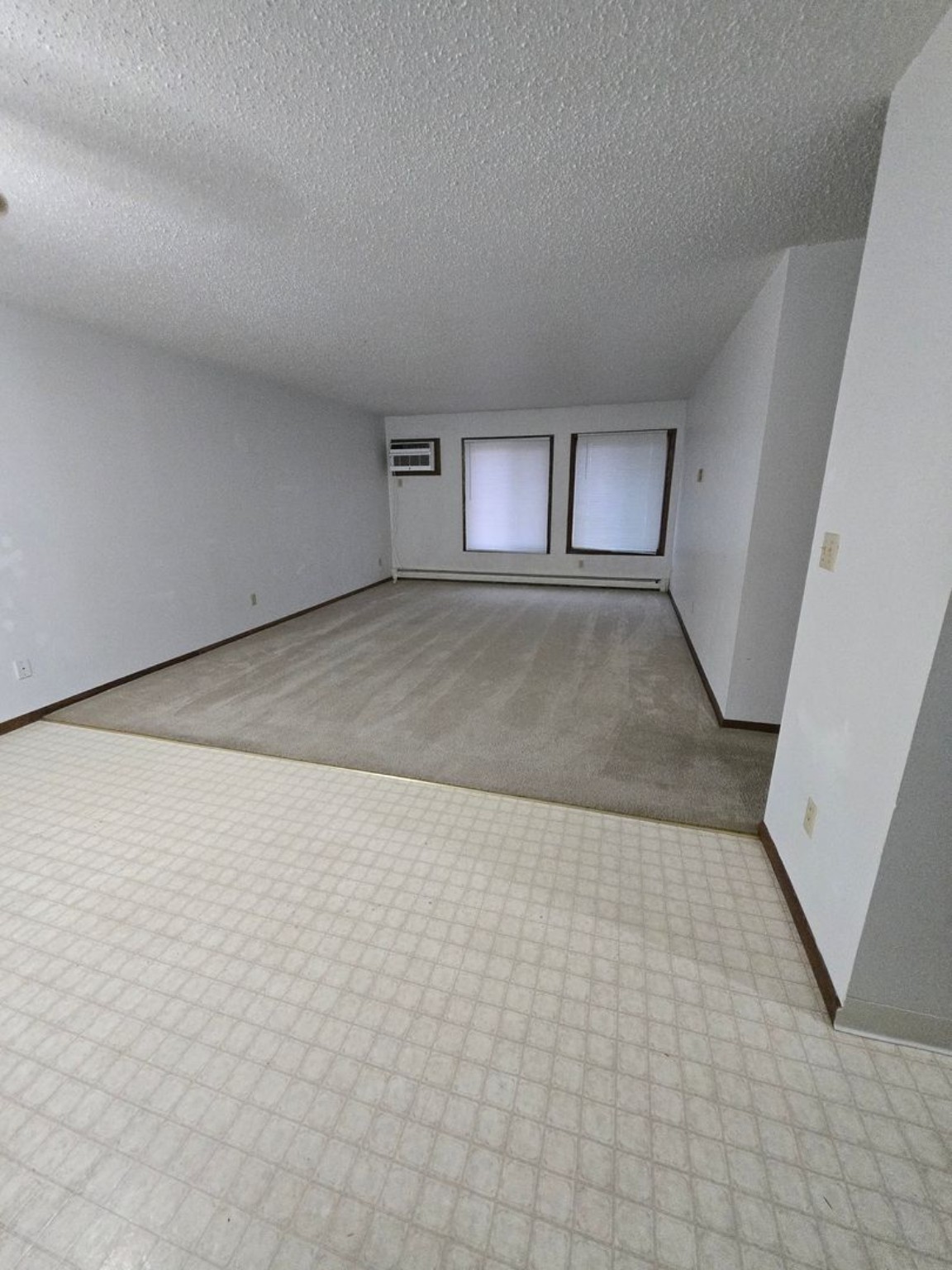 Courtwood two-bedroom apartment living and dining area