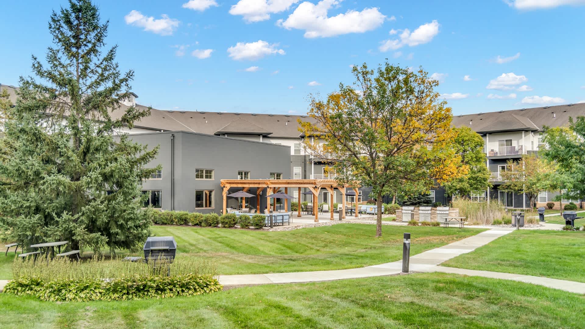 Chaska Place landscaped courtyard, walking paths, and outdoor pavilion