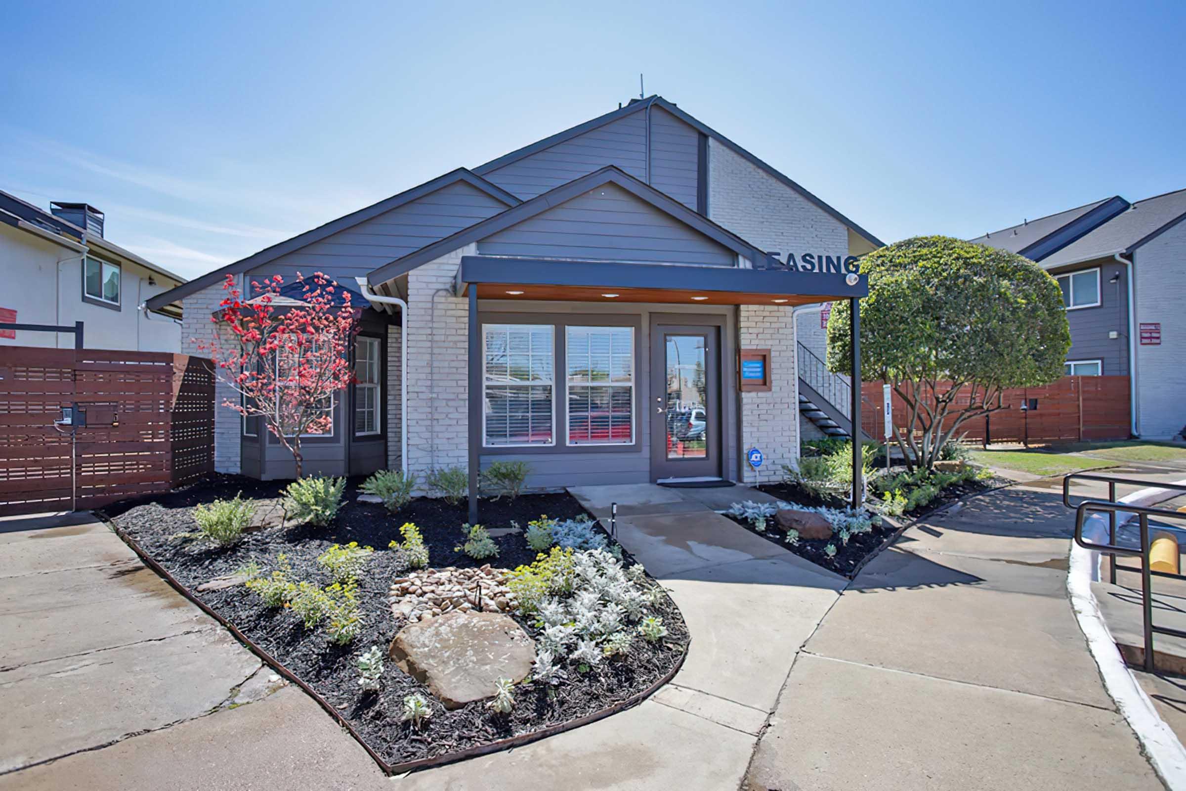 District at Midtown leasing office entrance and landscaping.