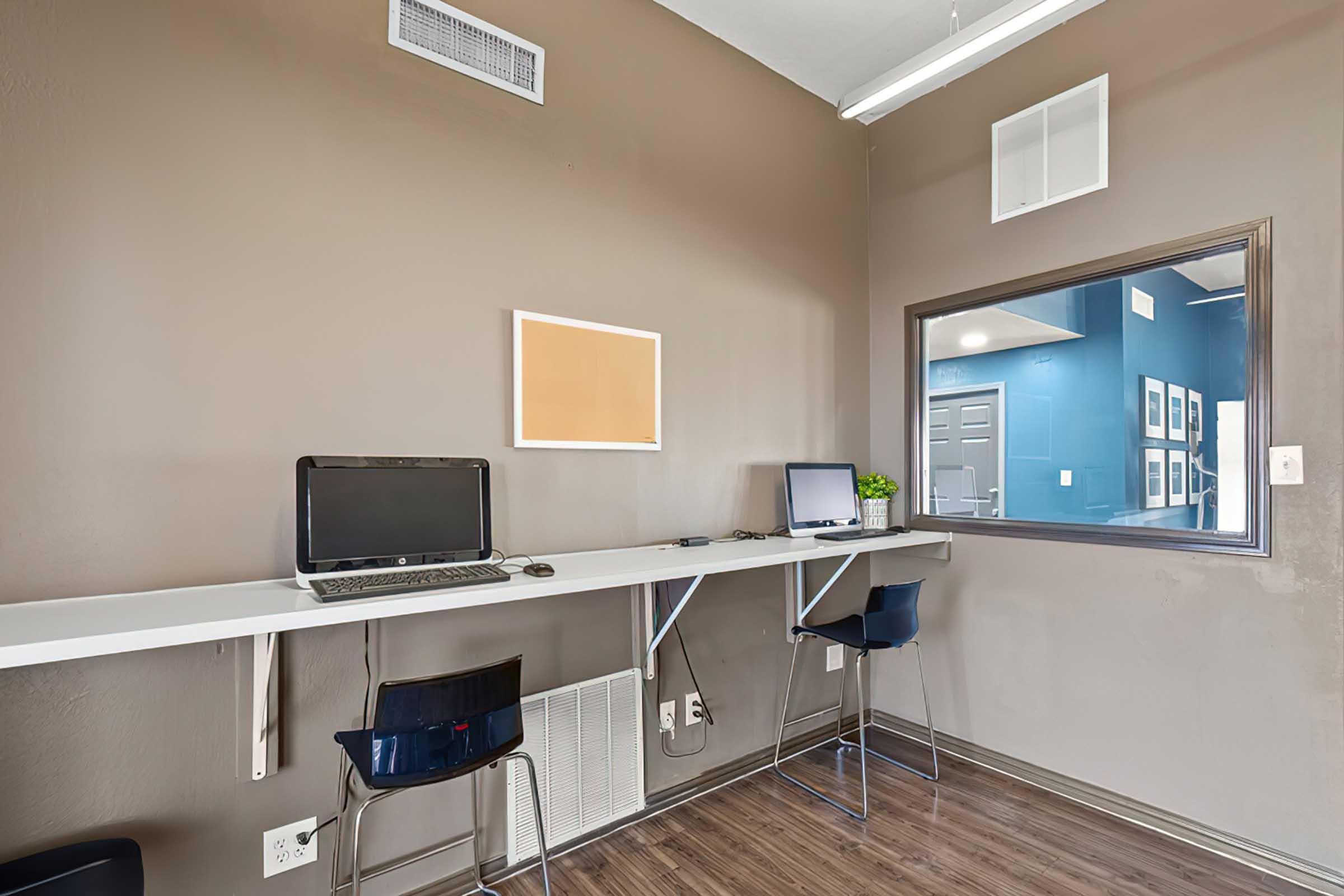 District at Midtown business center with computer workstations.