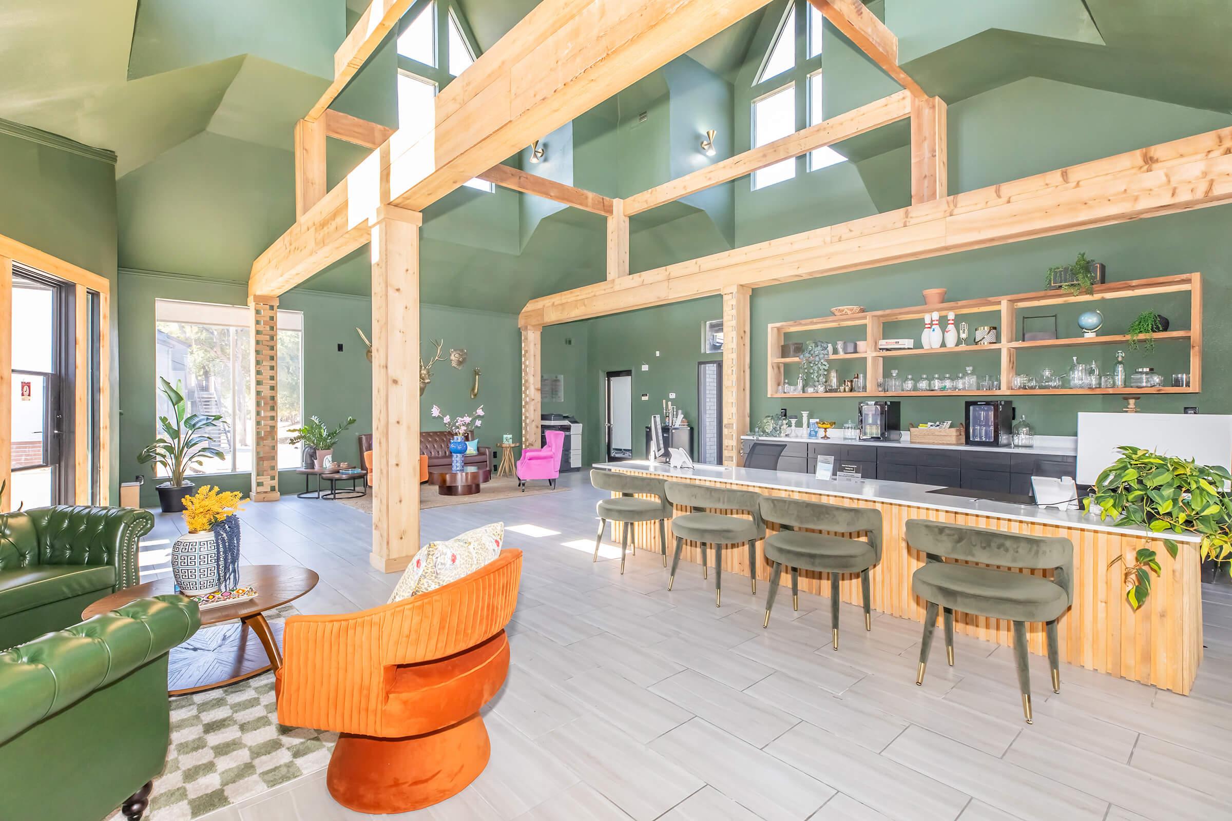 Winston clubhouse with exposed beams and seating