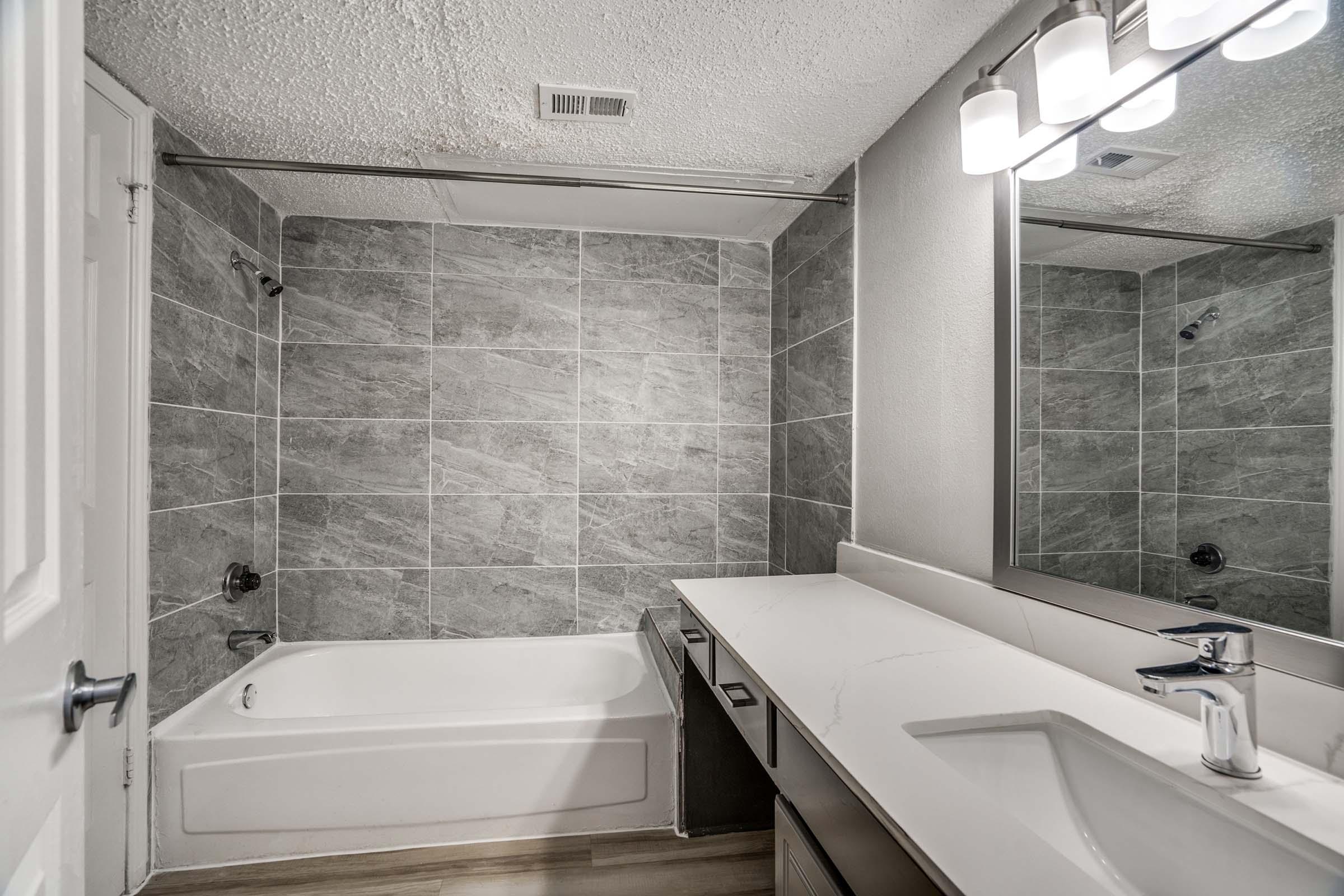 Winston apartment bathroom with bathtub