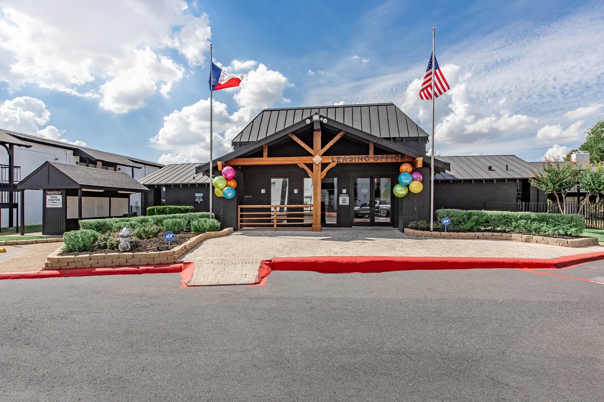 Maravilla leasing office exterior with landscaped entrance.