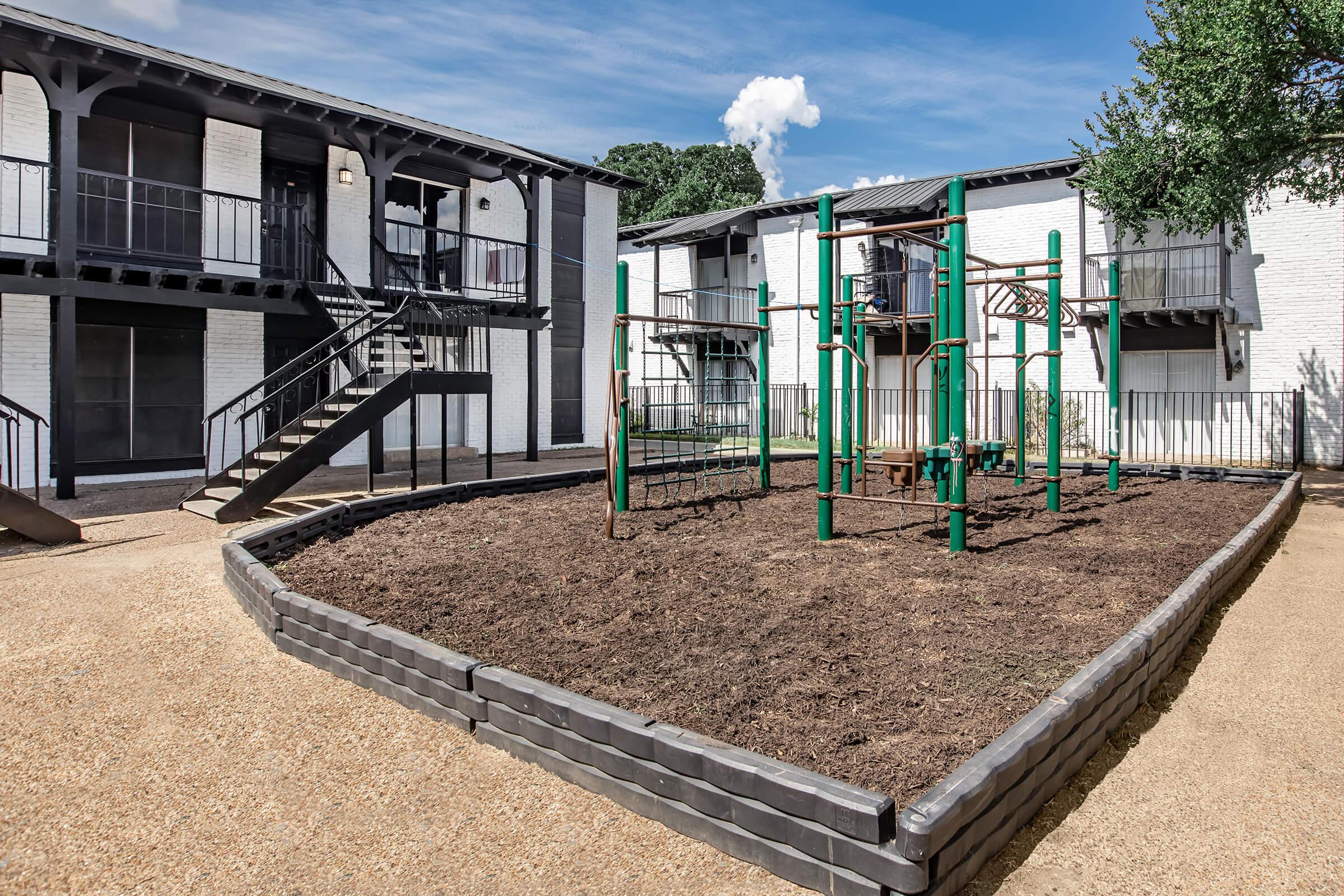 Maravilla outdoor playground beside the apartment buildings.