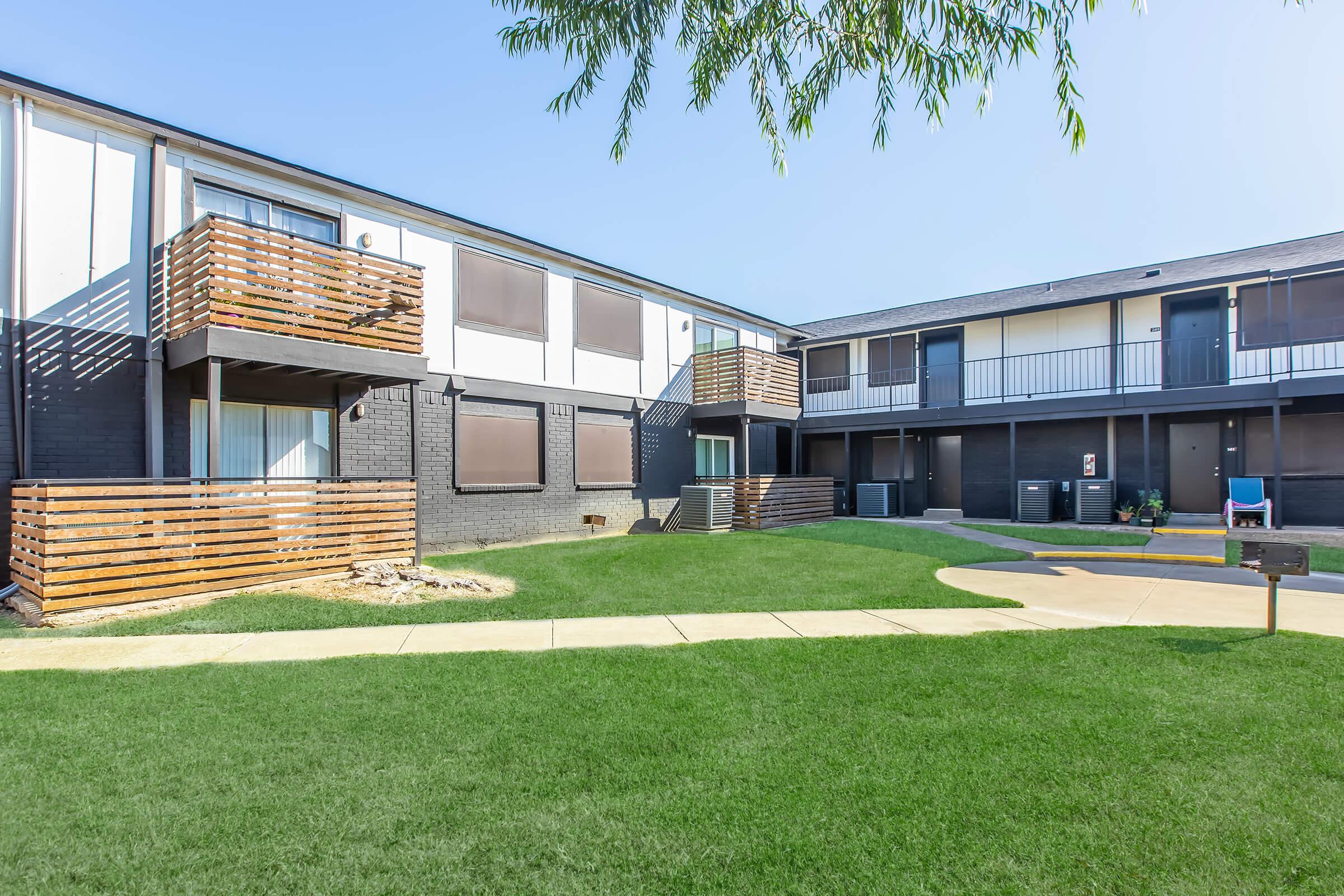 Pasadena apartment balconies and open lawn